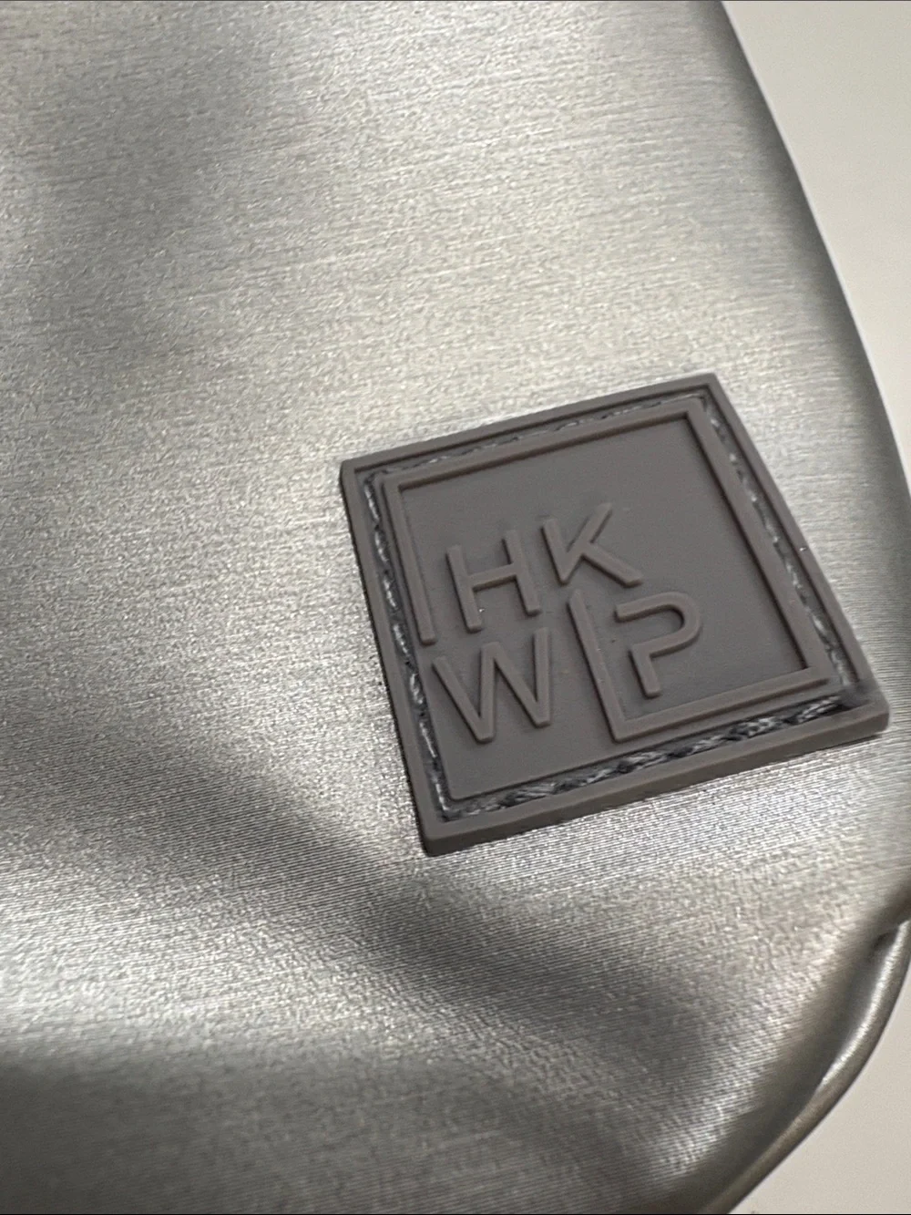 Ikwhip Metallic Matte Silver Everyday Crossbody Bag. Lots of pockets! Web strap